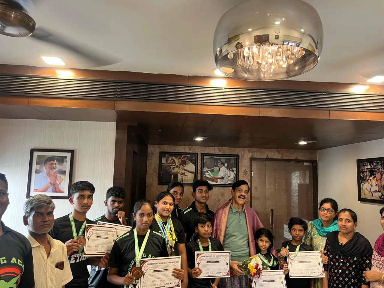 Mr. M.K. Mohan and Mr. Karthik Mohan honor Team Lethal national medalists